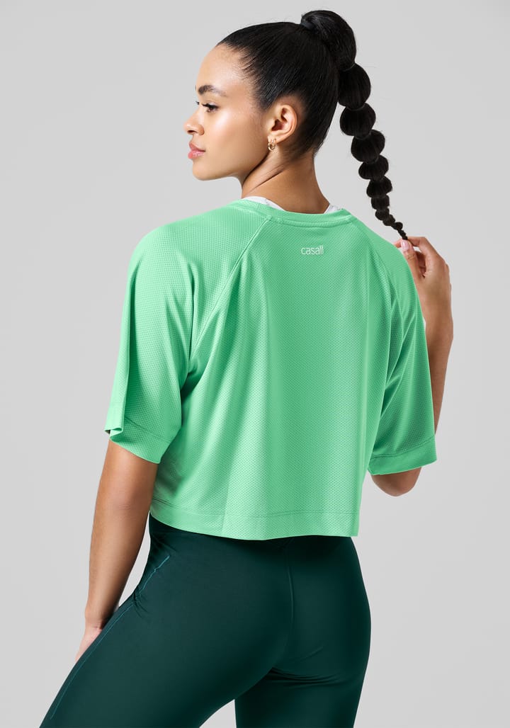 Casall Women's Laser Mesh Crop Tee Apple Crush Casall Casall Women's Laser Mesh Crop Tee Apple Crush Casall