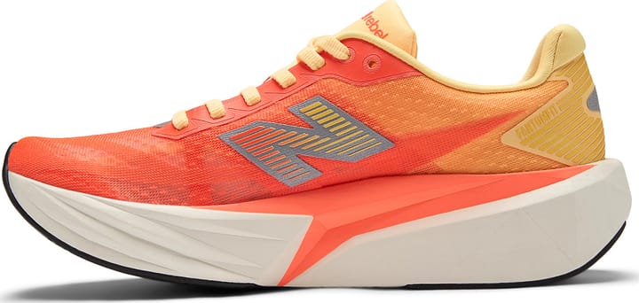 New Balance Women's Fuelcell Rebel V5 Tangerine Heat New Balance