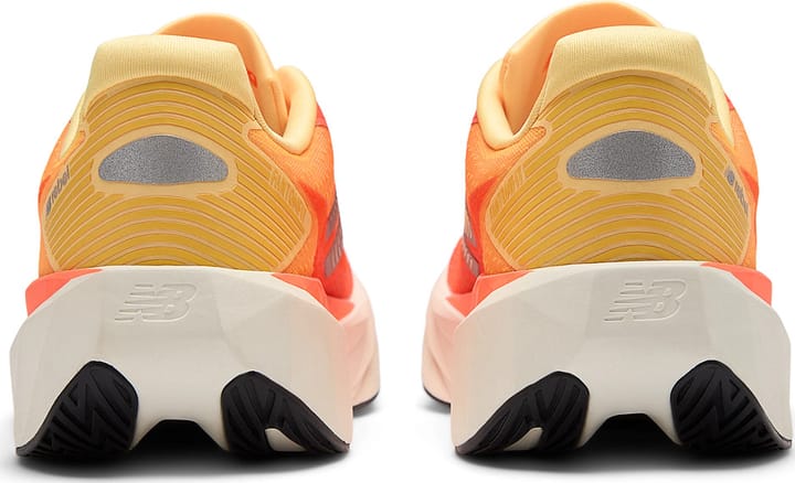 New Balance Women's Fuelcell Rebel V5 Tangerine Heat New Balance